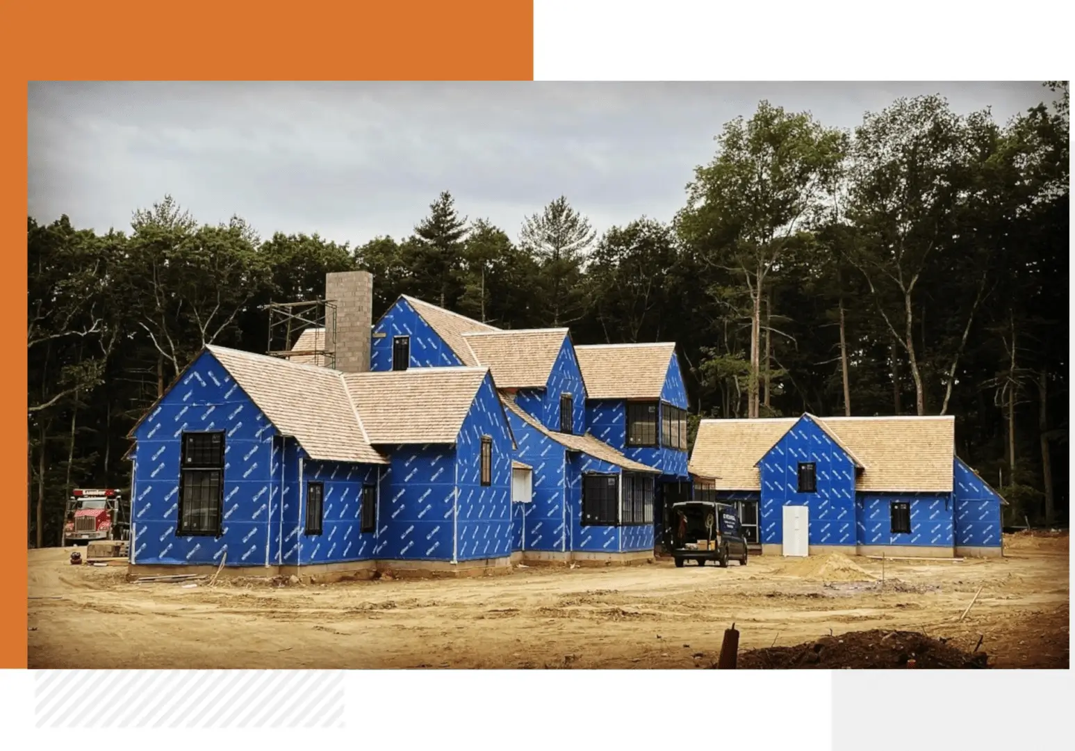 A blue house with some brown siding on it